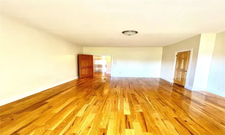 Empty room featuring light hardwood / wood-style floors