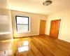 Unfurnished room featuring light wood-type flooring