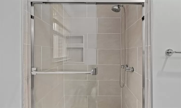 Bathroom with an enclosed shower