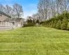 View of yard featuring a wooden deck