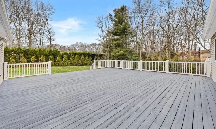 Wooden terrace with a yard