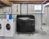 Washroom with washer and clothes dryer