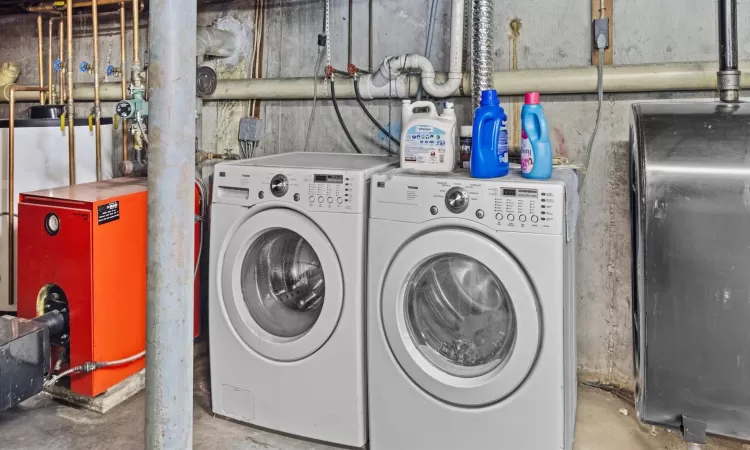 Laundry room featuring washer and dryer