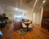 Living room with hardwood / wood-style flooring