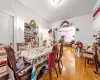 Dining room with hardwood / wood-style flooring