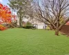 View of yard with a garage