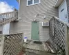 Property entrance featuring a wall unit AC