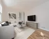 Living room with light wood-type flooring