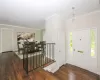 Entry way looking towards dining room, virtually staged