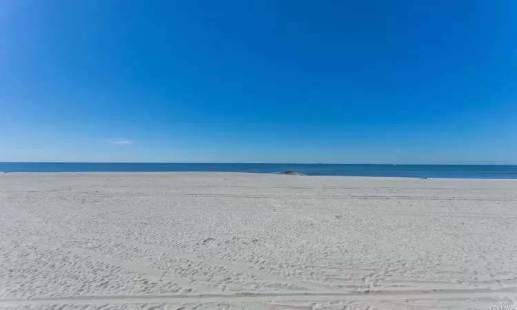 View of water feature featuring a beach view