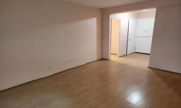 Empty room featuring light hardwood / wood-style flooring