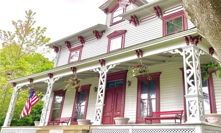 Italianate building with covered porch