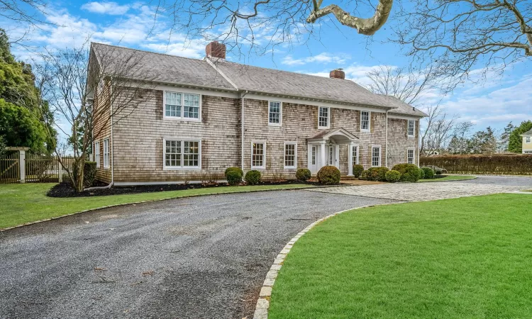 Back of property featuring a patio area and french doors