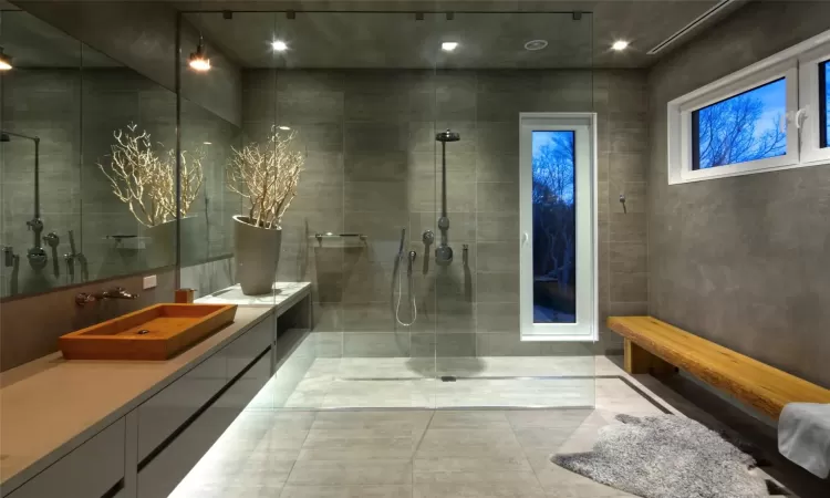 Bathroom featuring vanity and walk in shower