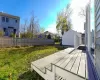 View of yard featuring a wooden deck