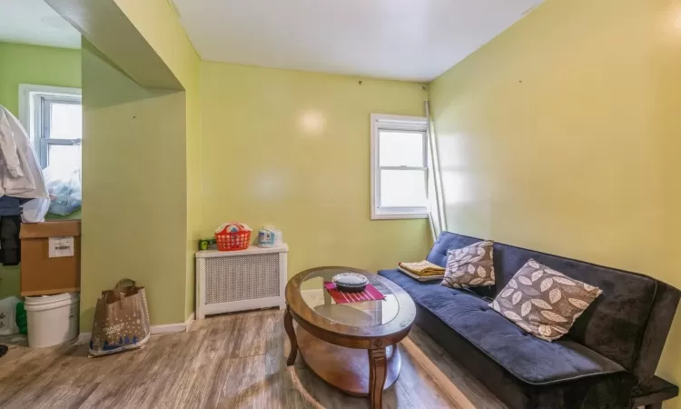 Living area featuring hardwood / wood-style floors