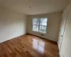 Unfurnished room with light hardwood / wood-style flooring