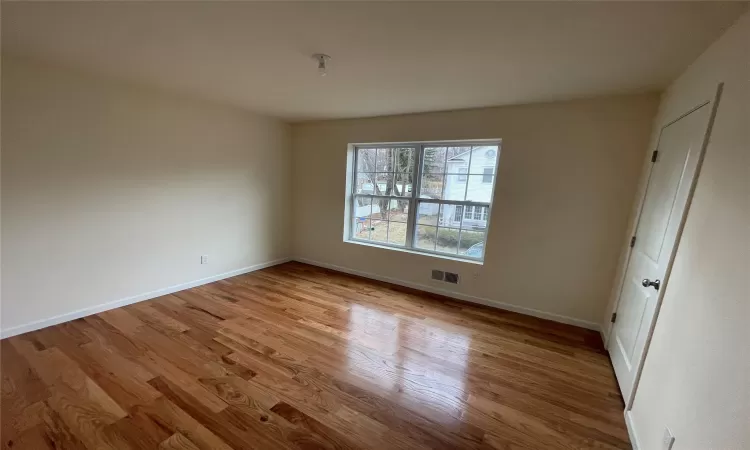 Unfurnished room featuring light hardwood / wood-style floors