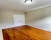 Empty room featuring hardwood / wood-style flooring