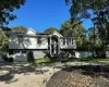 Split foyer home featuring a garage