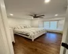 Bedroom with ceiling fan and Hardwood flooring