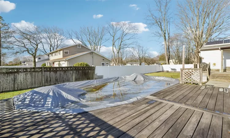 Wooden terrace with a hot tub