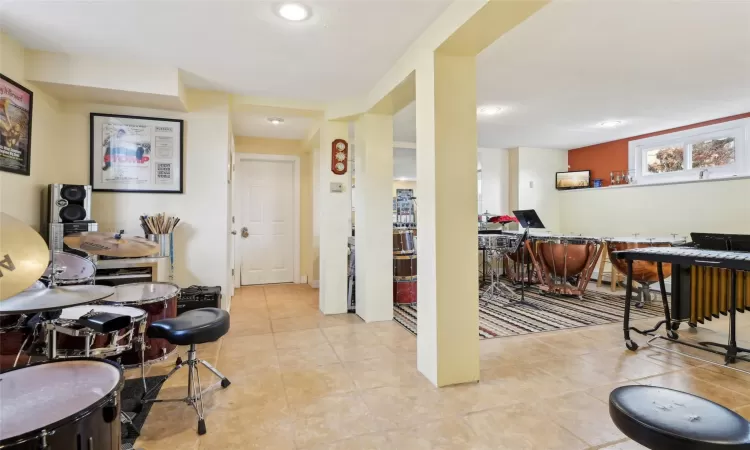 Miscellaneous room featuring plenty of natural light and bar area