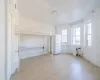 Unfurnished bedroom with light wood-type flooring