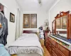 Bedroom featuring ceiling fan and light hardwood / wood-style floors