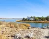 Waterfrontbulkheaded backyard with dock and jet ski pad