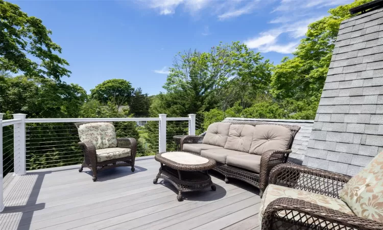 Wooden deck with an outdoor hangout area