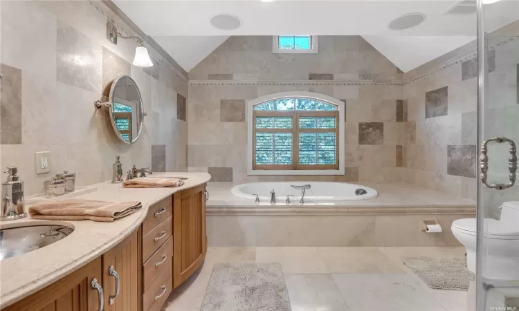 Primary Bathroom with Shower and Whirlpool Tub