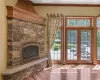 Gas Fireplace in Formal Living Room with French Doors to Rear Patio