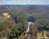 Aerial view with a water and mountain view