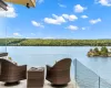 View of patio with a water view