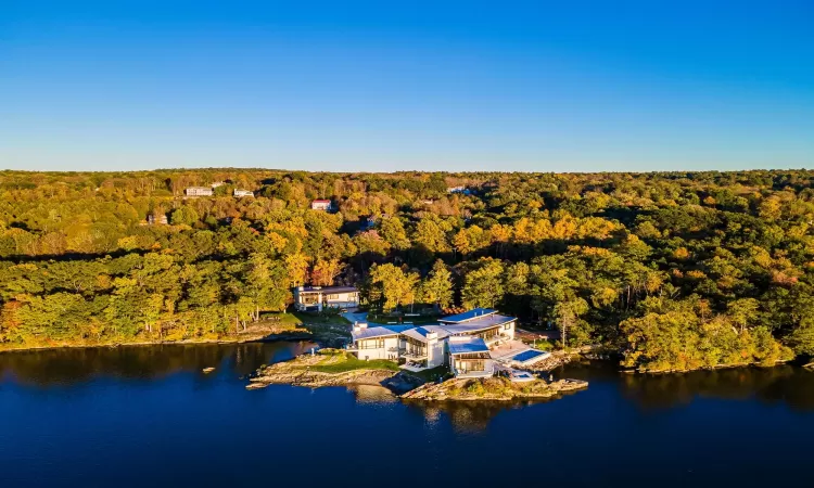 Aerial view featuring a water view