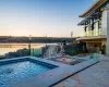 View of pool at dusk