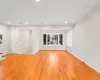 Unfurnished living room with light hardwood / wood-style flooring