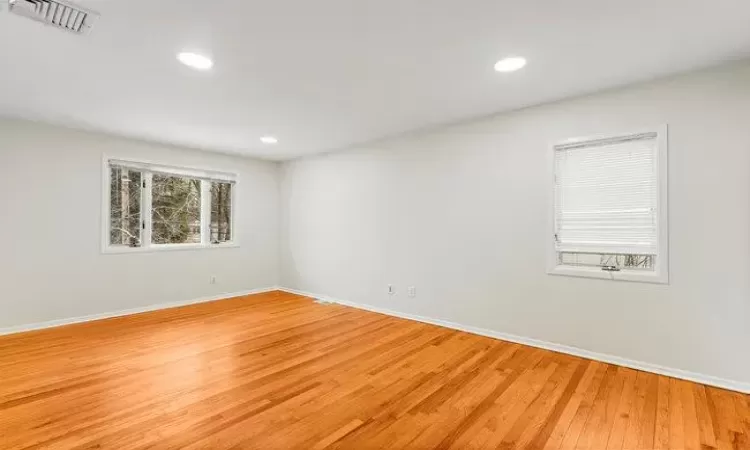 Spare room with hardwood / wood-style floors