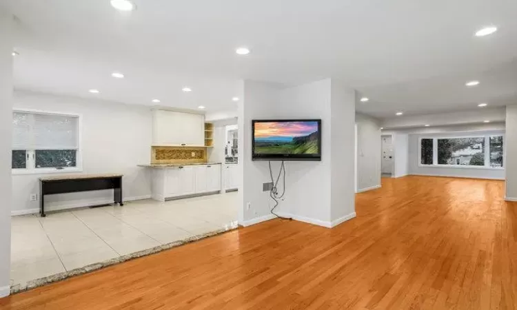 Unfurnished living room with light hardwood / wood-style floors