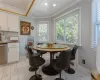 Dining space featuring ornamental molding