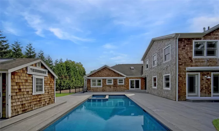 View of swimming pool featuring a deck