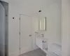 Bathroom with vanity and toilet