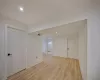 Unfurnished room with light hardwood / wood-style flooring