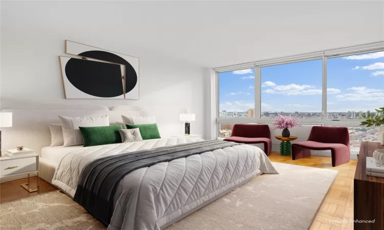 Bedroom with parquet flooring and multiple windows