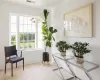 Sitting room featuring ornamental molding