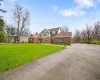 View of front of house with a front yard