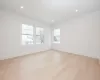 Bedroom featuring light hardwood flooring