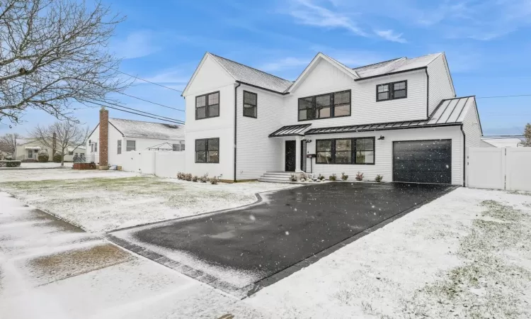 View of front of house with a garage