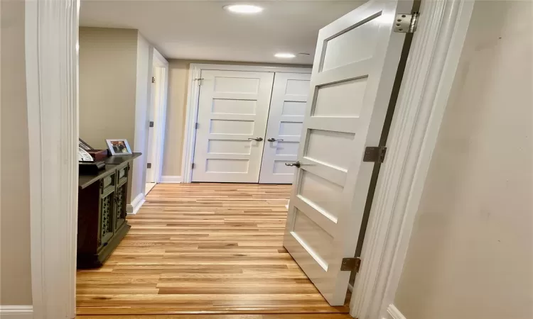 Hall with light wood-type flooring